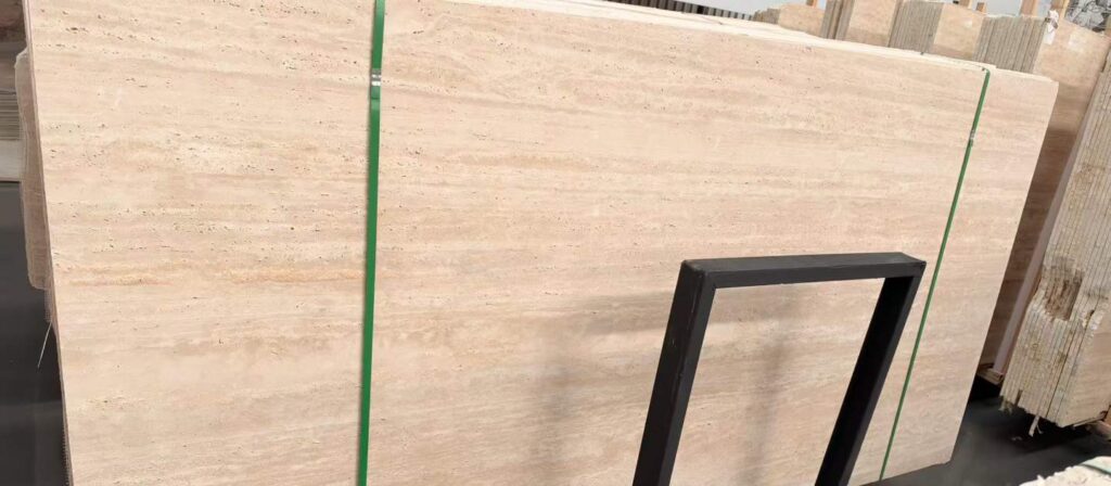 A single travertine slab standing on a steel frame, showing clear horizontal bedding across its face